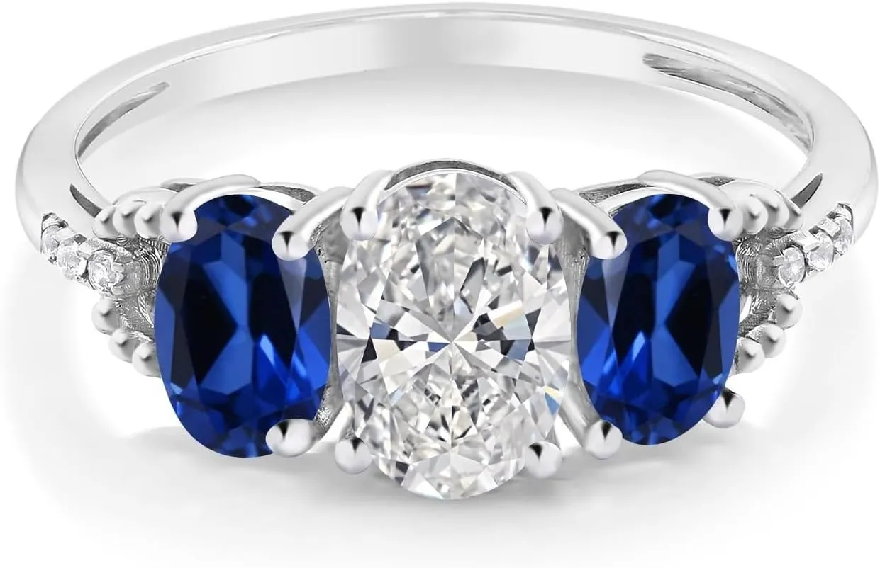 Gem Stone King 2.22 Cttw 10K White Gold IGI Certified Lab Grown Diamond and Blue Created Sapphire 3-Stone Engagement Ring | Center Oval Diamond 1.00 Ct | E-F Color | VS1-VS2 Clarity | Size 5,6,7,8,9